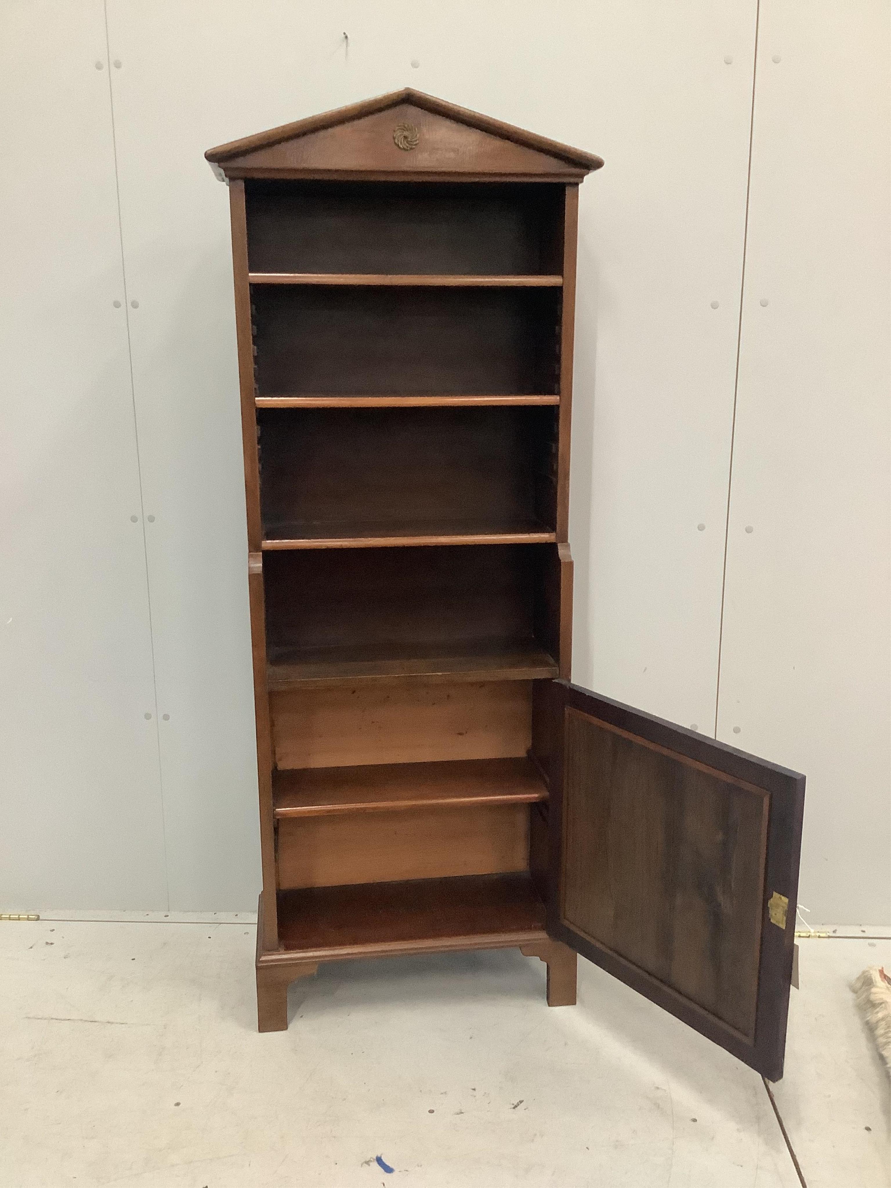 A Regency style mahogany open bookcase, width 60cm, depth 26cm, height 166cm. Condition - fair